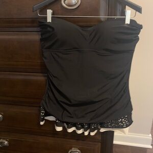 Black one piece swim suit with attached skirt. SizeXL